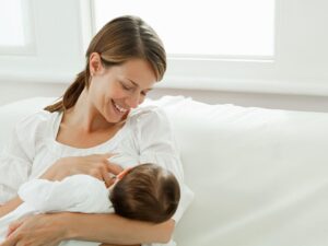 Photo of mother nursing an infant