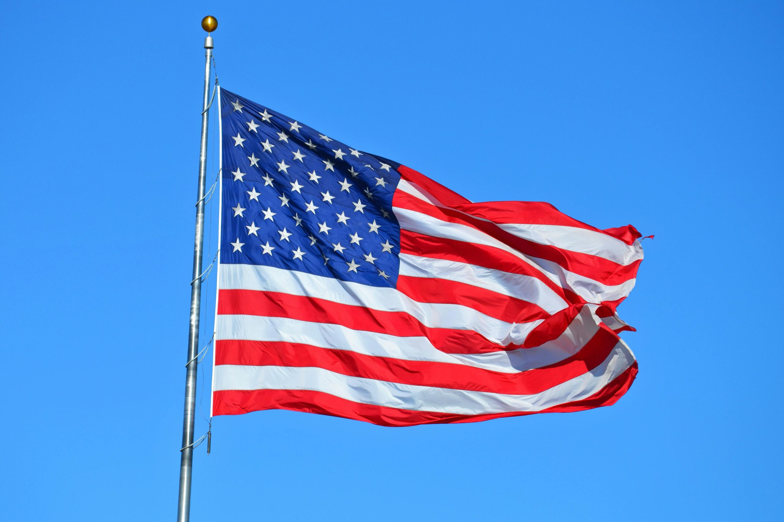 American flag against a blue background